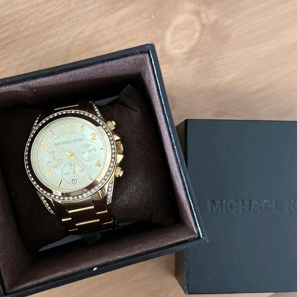 Womens gold Michael Kors watch cubic zirconia
